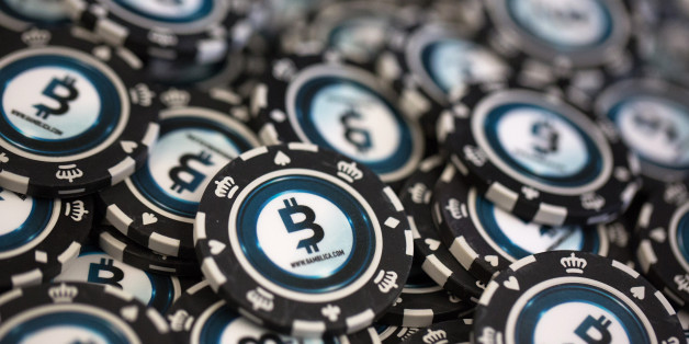 Casino gambling chips decorated with bitcoin logos sit on display at the CrytoSpace conference in Moscow, Russia, on Friday, Dec. 8, 2017. CryptoSpace is Eastern Europe's largest conference dedicated to blockchain technology and cryptocurrencies and runs Dec. 8-9. Photographer: Andrey Rudakov/Bloomberg via Getty Images
