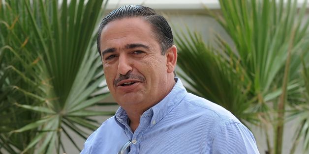 A picture taken on October 31, 2014 in Tunis shows Tunisian businessman Chafik Jarraya arriving for a meeting in Tunis. Jarraya is one of four people arrested in Tunisia on suspicion of corruption and financing a wave of protests in the North African country, a senior official said on May 24, 2017. / AFP PHOTO / FETHI BELAID (Photo credit should read FETHI BELAID/AFP/Getty Images)