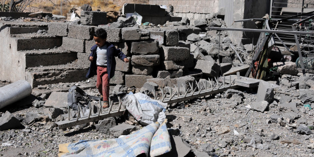SANAâA, YEMEN â DECEMBER 09: A boy walks on rubble of Yemenâs State Satellite Television Station after it was targeted by airstrikes of the Saudi-led coalition on December 09, 2017 in Sanaâa, Yemen. At least four journalists were killed by airstrikes hit the Yemenâs State Satellite Television Station. (Photo by Mohammed Hamoud/Getty Images)