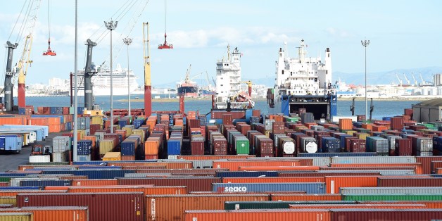Cargo ships unload imported goods in the Tunisian port city of Rades on November 12, 2014. The World Bank said in a report published last September that Tunisia's economic model of manufacturing for exports and protecting the domestic market was valid in the 1970s but since then had hindered progress. AFP PHOTO / FETHI BELAID (Photo credit should read FETHI BELAID/AFP/Getty Images)