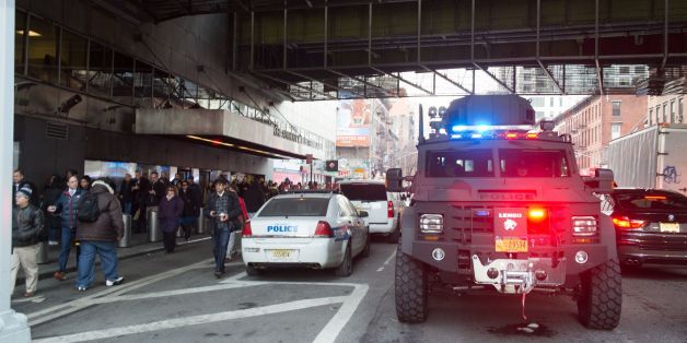 Police and other first responders respond to a reported explosion at the Port Authority Bus Terminal on December 11, 2017 in New York.New York police said Monday that they were investigating an explosion of 'unknown origin' in busy downtown Manhattan, and that people were being evacuated. Media reports said at least one person had been detained after the blast near the Port Authority transit terminal, close to Times Square.Early media reports said the blast came from a pipe bomb, and that severa