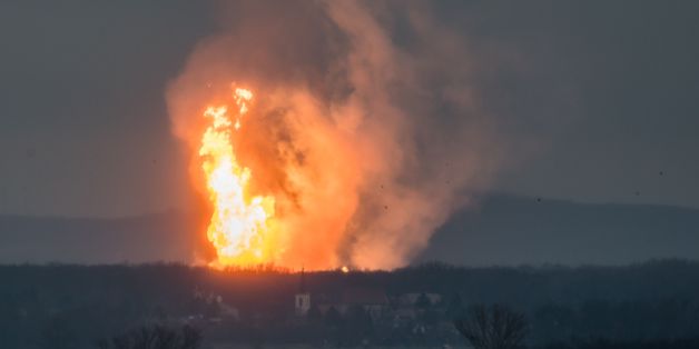 TOPSHOT - This picture taken on December 12, 2017 shows Austria's main gas pipeline hub at Baumgarten, Eastern Vienna, where an explosion rocked the site.The Kronen-Zeitung daily reported on its website that 60 people were hurt and that several fire brigades from the surrounding area were called. / AFP PHOTO / Tomas HULIK (Photo credit should read TOMAS HULIK/AFP/Getty Images)