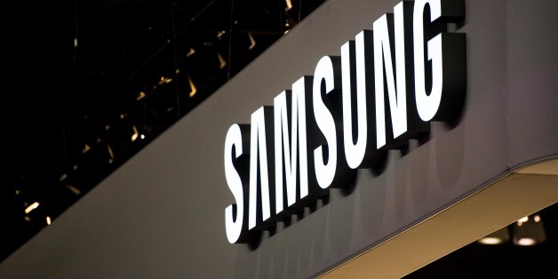 BARCELONA, SPAIN - MARCH 03: A logo sits illuminated outside the Samsung pavilion during the second day of the Mobile World Congress 2015 at the Fira Gran Via complex on March 3, 2015 in Barcelona, Spain. The annual Mobile World Congress hosts some of the wold's largest communication companies, with many unveiling their latest phones and wearables gadgets. (Photo by David Ramos/Getty Images)