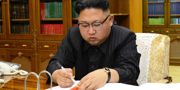 North Korean Leader Kim Jong Un signs the order to carry out the test-fire of inter-continental ballistic rocket Hwasong-14 in this undated photo released by North Korea's Korean Central News Agency (KCNA) in Pyongyang, July, 4 2017. KCNA/via REUTERS ATTENTION EDITORS - THIS IMAGE WAS PROVIDED BY A THIRD PARTY. REUTERS IS UNABLE TO INDEPENDENTLY VERIFY THIS IMAGE. NO THIRD PARTY SALES. SOUTH KOREA OUT. TPX IMAGES OF THE DAY