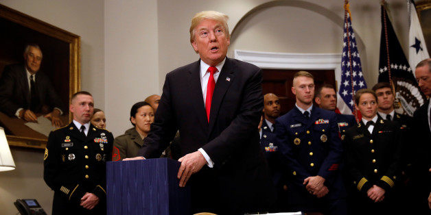 U.S. President Donald Trump participates in a signing ceremony for the National Defense Authorization Act for Fiscal Year 2018 at the White House in Washington D.C., U.S. December 12, 2017. REUTERS/Carlos Barria