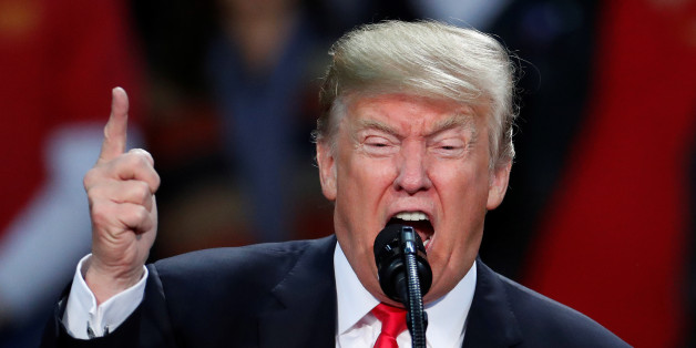 U.S. President Donald Trump uses his famous "You're fired" line at a rally in Pensacola, Florida, U.S., December 8, 2017. REUTERS/Carlo Allegri