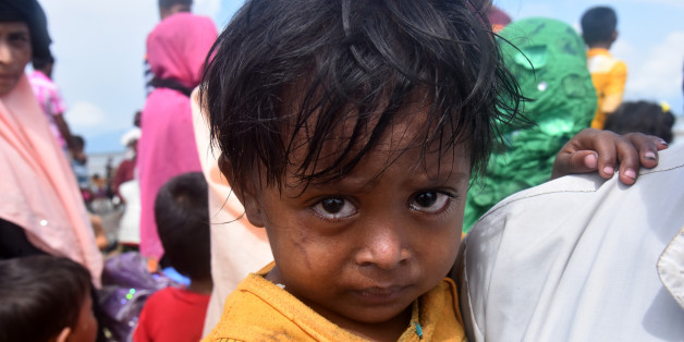 Hundreds of Rohingya people crossing Bangladesh's border as they flee from Buchidong at Myanmar after crossing the Nuf River Shah Porir Dwip Island near Teknaf in Cox's Bazar, Bangladesh, on September 07, 2017. According to the United Nations High Commissioner for Refugees (UNHCR) more than 525,000 Rohingya refugees have fled from Myanmar for violence over the last month with most of them trying to cross border reach Bangladesh. International organizations have reported claims of human rights vi