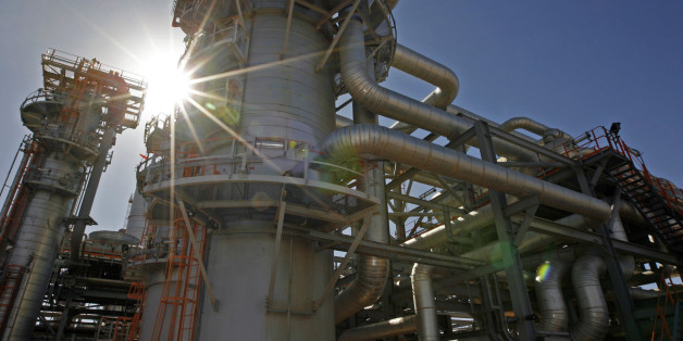 ALGERIA - DECEMBER 14: The In Salah Gas (ISG) Krechba Project, run by Sonatrach, British Petroleum (BP), and StatoilHydro, operates in the Sahara desert near In Salah, Algeria, on Sunday, Dec. 14, 2008. From produced gas, the carbon capture plant, the largest and first of its kind, removes annually the carbon dioxide emissions equivalent of 200,000 automobiles running 30,000 kilometers. The CO2 is then reinjected into a two-kilometer deep reservoir instead of the atmosphere, with the intention