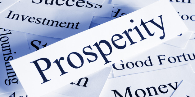 A conceptual look at prosperity with associated words, blue toned.