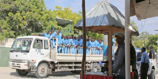 MOGADISHU, SOMALIA - DECEMBER 14: Somalian police cadets on a truck are seen at the scene after a suicide attack at police academy in Mogadishu, Somalia on December 14, 2017. At least 10 people were killed and 15 others injured after a suicide bomber wearing a police uniform blew up himself outside a police academy in the Somali capital, Mogadishu, local media reported. The suicide bomber infiltrated the police checkpoints and blew up himself during a police gathering, Somali National News Agen