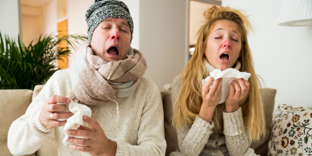 Sick couple catch cold. Man and woman sneezing, coughing. People got flu, having runny nose.