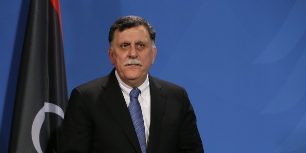 BERLIN, GERMANY - DECEMBER 07: Chairman of the Presidential Council of Libya and Prime Minister of the Government of National Accord of Libya Fayez al-Sarraj and German Chancellor Angela Merkel (not seen) hold a joint press conference following their meeting in Berlin, Germany on December 07, 2017. (Photo by Cuneyt Karadag/Anadolu Agency/Getty Images)