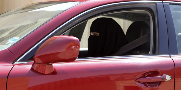 A woman drives a car in Saudi Arabia October 22, 2013. A conservative Saudi Arabian cleric has said women who drive risk damaging their ovaries and bearing children with clinical problems, countering activists who are trying to end the Islamic kingdom's male-only driving rules. Saudi Arabia is the only country in the world where women are barred from driving, but debate about the ban, once confined to the private sphere and social media, is increasingly spreading to public forums too. REUTERS/Fa