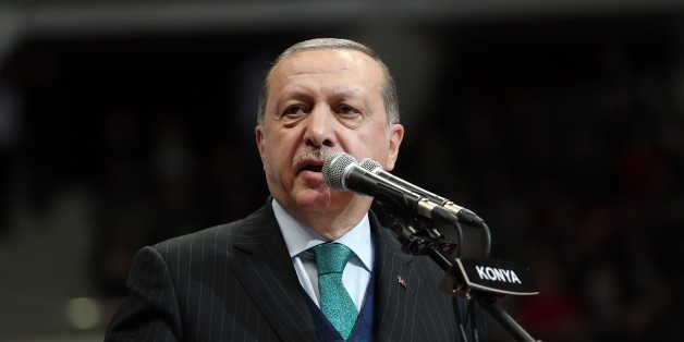 KONYA, TURKEY - DECEMBER 17: (----EDITORIAL USE ONLY MANDATORY CREDIT - ' TURKISH PRESIDENCY / MURAT CETINMUHURDAR / HANDOUT' - NO MARKETING NO ADVERTISING CAMPAIGNS - DISTRIBUTED AS A SERVICE TO CLIENTS----) President of Turkey Recep Tayyip Erdogan addresses during a commemoration ceremony marking the 744th death anniversary of Islamic scholar and Sufi mystic Mevlana Rumi at Konya Metropolitan Municipality Sports And Congress Center in Konya, Turkey on December 17, 2017. (Photo by Turkish Pres