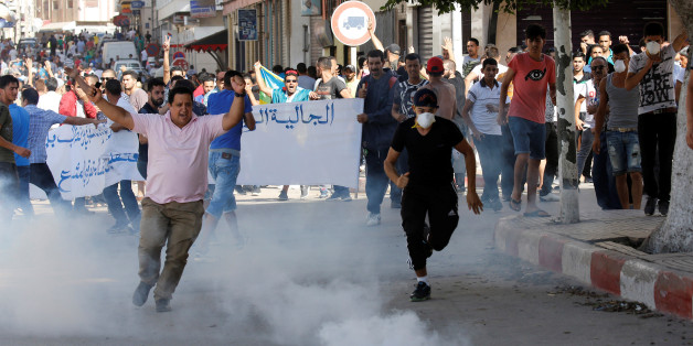 Riot police fired tear gas towards protesters during a demonstration against alleged corruption in the town of Al-Hoceima, Morocco July 20, 2017. REUTERS/Youssef Boudlal
