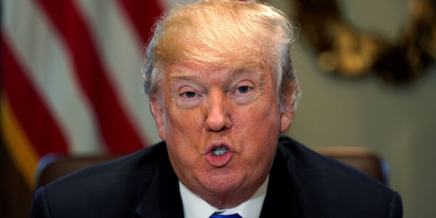 U.S. President Donald Trump delivers remarks to reporters at the start of a cabinet meeting at the White House in Washington, U.S., December 20, 2017. REUTERS/Jonathan Ernst