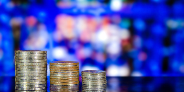 Finance and Money concept with savings, Money coin stack growing graph with bokeh of night cityscape light in background
