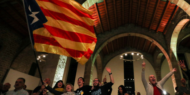 People react to results in Catalonia's regional elections at a gathering of the Catalan National Assembly (ANC) in Barcelona, Spain December 21, 2017. REUTERS/Albert Gea