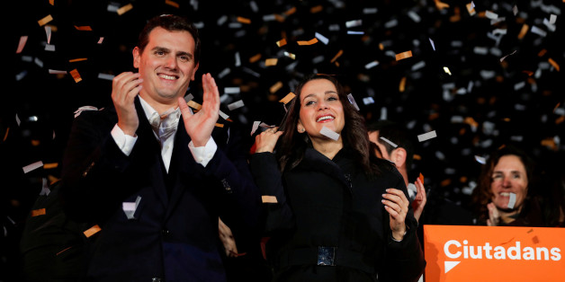 Catalan Ciudadanos leader Ines Arrimadas (C) smiles next to Ciudadanos national leader Albert Rivera at a Ciudadanos rally after results were announced in Catalonia's regional elections in Barcelona, Spain, December 21, 2017. REUTERS/Eric Gaillard TPX IMAGES OF THE DAY