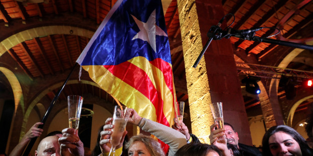 People react to results in Catalonia's regional elections at a gathering of the Catalan National Assembly (ANC) in Barcelona, Spain December 21, 2017. REUTERS/Albert Gea TPX IMAGES OF THE DAY