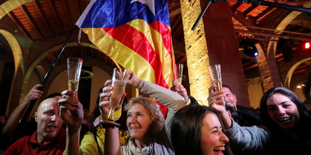 People react to results in Catalonia's regional elections at a gathering of the Catalan National Assembly (ANC) in Barcelona, Spain December 21, 2017. REUTERS/Albert Gea TPX IMAGES OF THE DAY