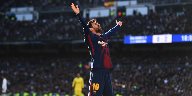 MADRID, SPAIN - DECEMBER 23: Lionel Messi of Barcelona celebrates after scoring his sides second goal during the La Liga match between Real Madrid and Barcelona at Estadio Santiago Bernabeu on December 23, 2017 in Madrid, Spain. (Photo by Denis Doyle/Getty Images)