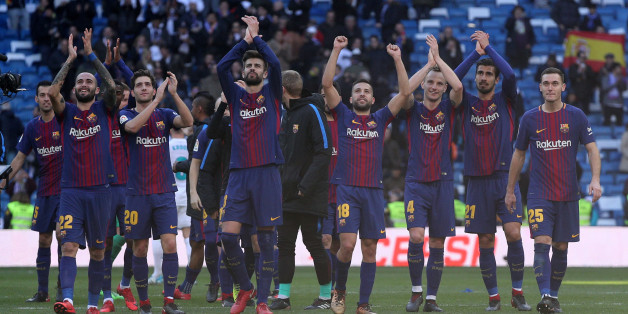 Soccer Football - La Liga Santander - Real Madrid vs FC Barcelona - Santiago Bernabeu, Madrid, Spain - December 23, 2017 Barcelonaâs Gerard Pique and team mates applaud the fans at the end of the match REUTERS/Sergio Perez
