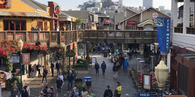 Coit tower & Transamerica Pyramid are seen from Pier 39 at San Francisco Fisherman Wharf on October 18, 2017. / AFP PHOTO / Daniel SLIM (Photo credit should read DANIEL SLIM/AFP/Getty Images)