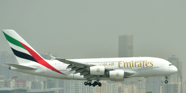 A picture take on September 14, 2017 shows an Airbus A380 of Emirates landing at the tarmac at Dubai's International Airport.
/ AFP PHOTO / GIUSEPPE CACACE (Photo credit should read GIUSEPPE CACACE/AFP/Getty Images)