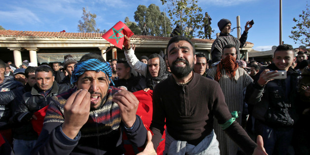People shout slogans during a protest after two miners died while working in a clandestine coal mine, in Jerada, Morocco December 26, 2017. REUTERS/Youssef Boudlal