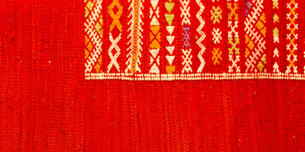 Handmade by berber woman colourful rugs in vibrant tones for sale in media souke