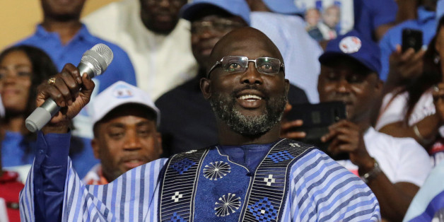 George Weah, former soccer player and presidential candidate of Congress for Democratic Change (CDC), reacts while a speech during the party's presidential campaign rally at Samuel Kanyon Doe Sports Complex in Monrovia, Liberia, December 23, 2017. REUTERS/Thierry Gouegnon