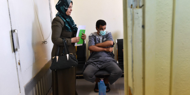 Algerian Abderahman, 47, who had a kidney transplant, stands next to his sister while waiting at Batna's university hospital's nephrology department, 435 kms east of Algiers, on July 26, 2017.In Algeria and across the entire Maghreb in North Africa, many people continue to suffer or die because of the lack of donors. Part of the problem lies with laws restricting the harvesting of human organs, coupled with cultural or religious reticence, despite Muslim theologians' approval of organ donations.
