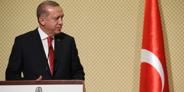 TUNIS, TUNISIA - DECEMBER 27: (----EDITORIAL USE ONLY MANDATORY CREDIT - ' TURKISH PRESIDENCY / YASIN BULBUL / HANDOUT' - NO MARKETING NO ADVERTISING CAMPAIGNS - DISTRIBUTED AS A SERVICE TO CLIENTS----) President of Turkey Recep Tayyip Erdogan gestures during a joint press conference held with Tunisian President Beji Caid Essebsi (not seen) after an inter-delegation meeting at Presidential Palace in Tunis, Tunisia on December 27, 2017. (Photo by Turkish Presidency / Yasin Bulbul / Handout/Anado