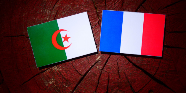 Algerian flag with French flag on a tree stump isolated