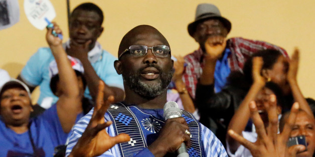 George Weah, former soccer player and presidential candidate of Congress for Democratic Change (CDC), delivers a speech during the party's presidential campaign rally at Samuel Kanyon Doe Sports Complex in Monrovia, Liberia, December 23, 2017. REUTERS/Thierry Gouegnon