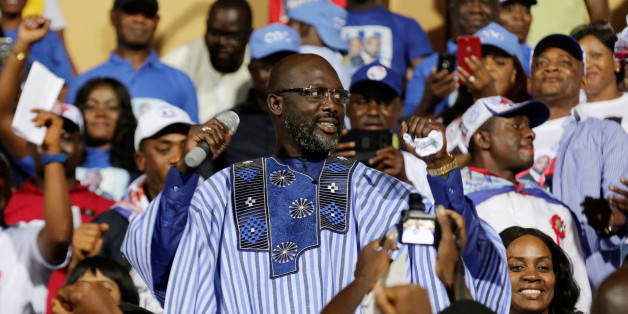 George Weah, former soccer player and presidential candidate of Congress for Democratic Change (CDC), reacts during the party's presidential campaign rally at Samuel Kanyon Doe Sports Complex in Monrovia, Liberia December 23, 2017. REUTERS/Thierry Gouegnon