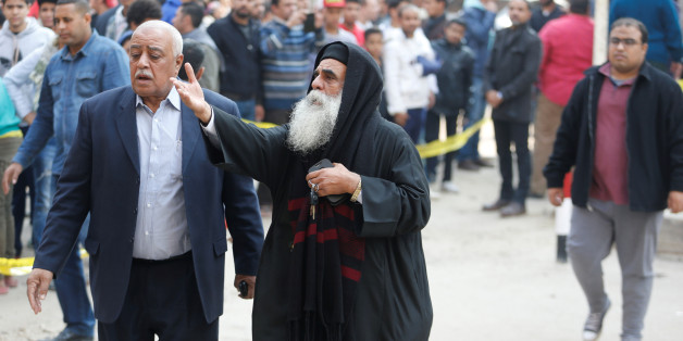 A priest reacts at the site of attack on a church in the Helwan district south of Cairo, Egypt December 29, 2017. REUTERS/Amr Abdallah Dalsh