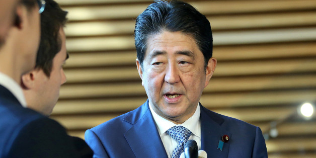 Japanese Prime Minister Shinzo Abe answers questions after a telephone talk with US President Donald Trump at his official residence in Tokyo on November 29, 2017. Abe said that the latest North Korean missile launch was a 'violent act' that 'can never be tolerated' after the ICBM splashed down in its exclusive economic zone (EEZ). JAPAN OUT / AFP PHOTO / JIJI PRESS / STR / Japan OUT (Photo credit should read STR/AFP/Getty Images)