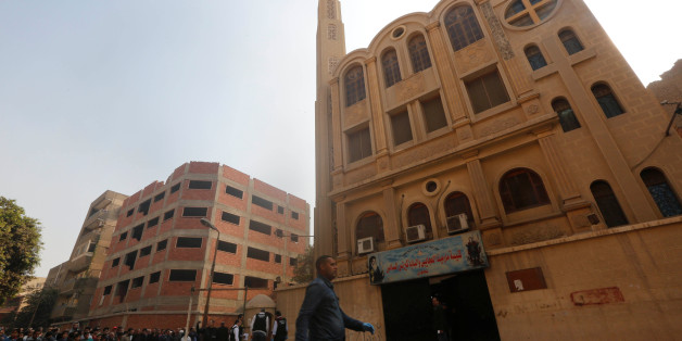 Policemen inspect the site of attack on Mar Mina church in Helwan district on the outskirts of Cairo, Egypt, December 29, 2017. REUTERS/Amr Abdallah Dalsh