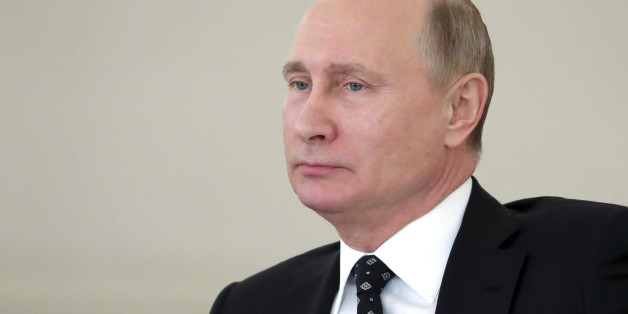 Russian President Vladimir Putin attends a meeting of the State Council at the Kremlin in Moscow, Russia December 27, 2017. Sputnik/Mikhail Klimentyev/Kremlin via REUTERS ATTENTION EDITORS - THIS IMAGE WAS PROVIDED BY A THIRD PARTY.