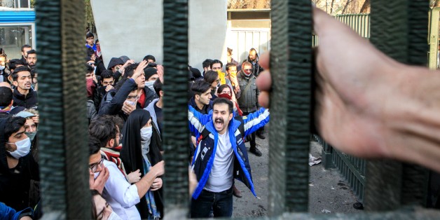 TEHRAN, IRAN - DECEMBER 30 : People gather to protest over high cost of living in Tehran, Iran on December 30, 2017. (Photo by Stringer/Anadolu Agency/Getty Images)