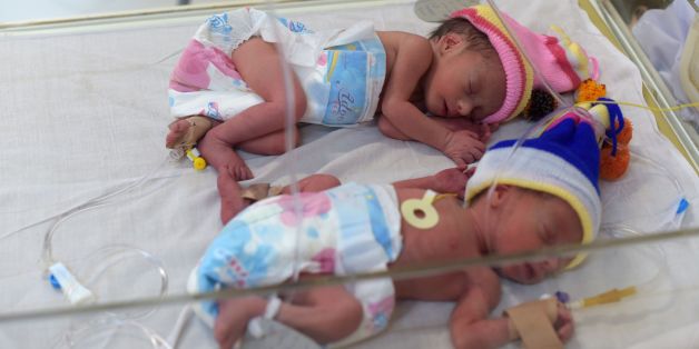 This picture taken on December 26, 2017 shows newborn babies at a maternity ward in the Malalai Maternity Hospital in Kabul.
January 1 is Samad Alawi's birthday. It's also the birthday of his wife, his two sons, 32 of his friends and thousands of other Afghans -- a date chosen for convenience by a generation who do not know when they were born. / AFP PHOTO / Shah MARAI / TO GO WITH 'AFGHANISTAN-SOCIAL-OFFBEAT',FOCUS,BY EMAL HAIDARY (Photo credit should read SHAH MARAI/AFP/Getty Images)