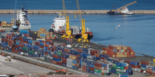 Containers sit stacked at a port terminal in Algiers, Algeria November 12, 2017. Picture taken November 12,2017. REUTERS/ Zohra Bensemra