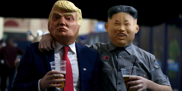 Fans dressed as President of the United States Donald Trump and leader of North Korea Kim Jong-un during day three of the William Hill World Darts Championship at Alexandra Palace, London. (Photo by Steven Paston/PA Images via Getty Images)
