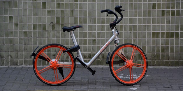 Mobike bicycles parked on a sidewalk in Jing'an district, Shanghai, a popular, new bike sharing rental online service system.