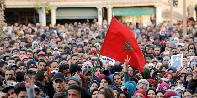 People attend a protest after two miners died while working in a clandestine coal mine, in Jerada, Morocco December 26, 2017. REUTERS/Youssef Boudlal