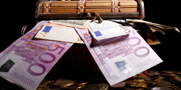 Tunisian flag on top of crate full of money