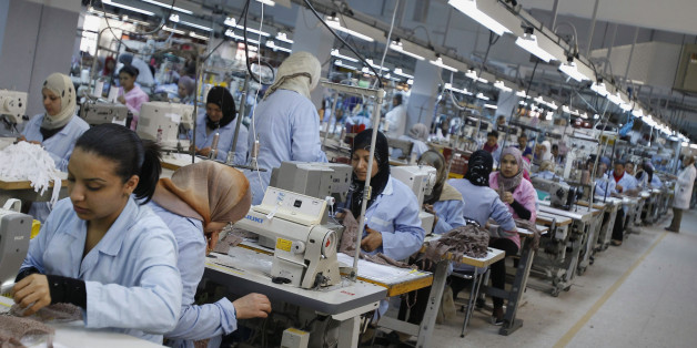 Tunisian Employees work at an underwear factory in Sfax, 260 km (162 miles) south of Tunis March 22, 2012. A string of countries on and around the fringes of western Europe are becoming new centres of fashion clothing manufacture as China's factories and labourers move up in the world and brands discover pliant suppliers conveniently close to home. To match story CHINA/FASHION REUTERS/Zoubeir Souissi (TUNISIA - Tags: BUSINESS TEXTILE)