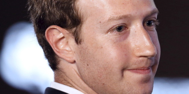Facebook CEO Mark Zuckerberg asks a question during the II CEO Summit of the Americas on the sidelines of the VII Summit of the Americas in Panama City April 10, 2015. REUTERS/Carlos Garcia Rawlins